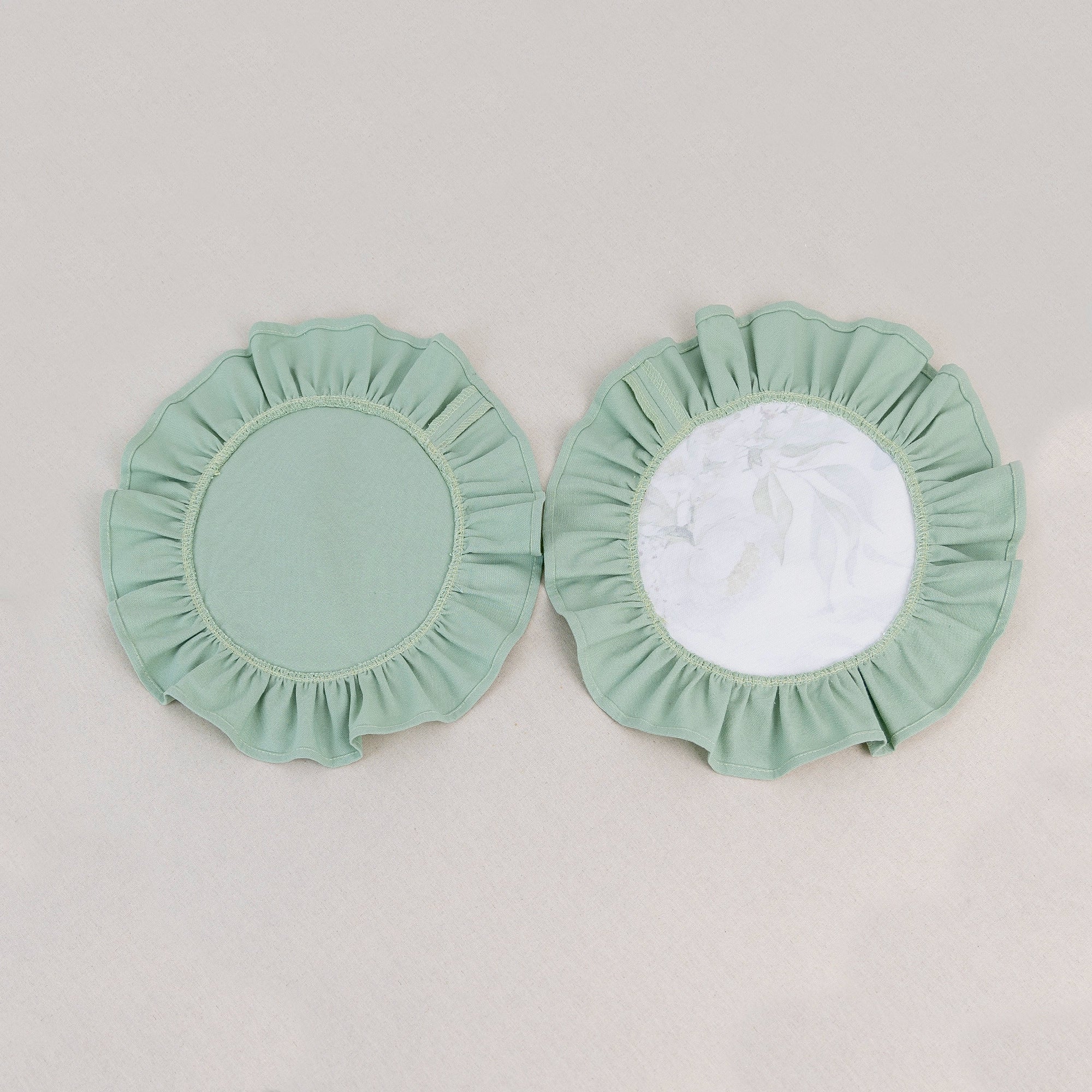 Sage green floral placemat set with peonies and eucalyptus