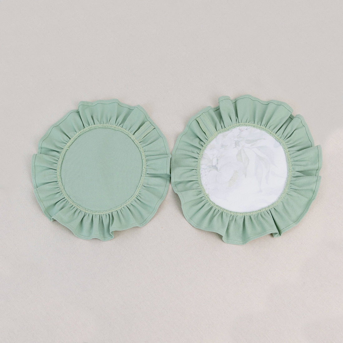 Sage green floral placemat set with peonies and eucalyptus