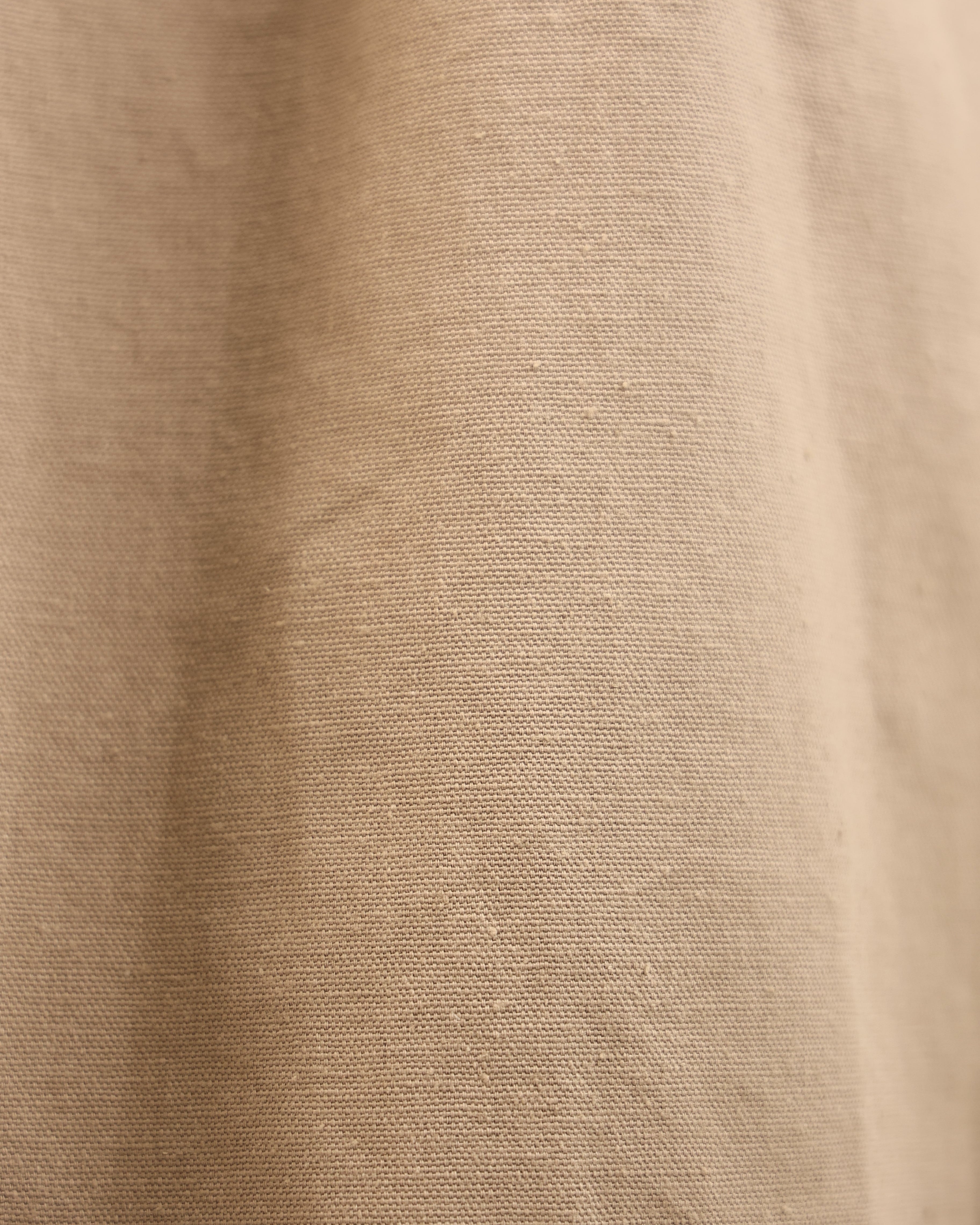 Close-up of beige fabric texture