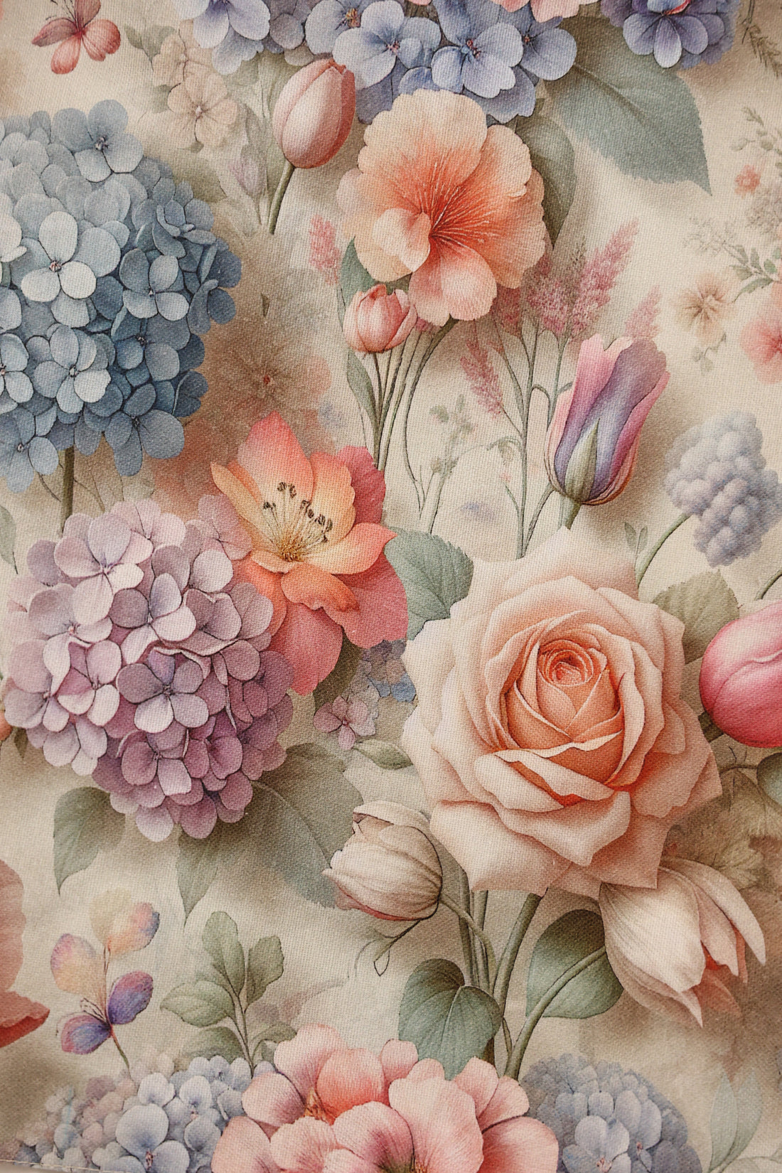 Detailed floral arrangement with roses, hydrangeas, and tulips on a textured background