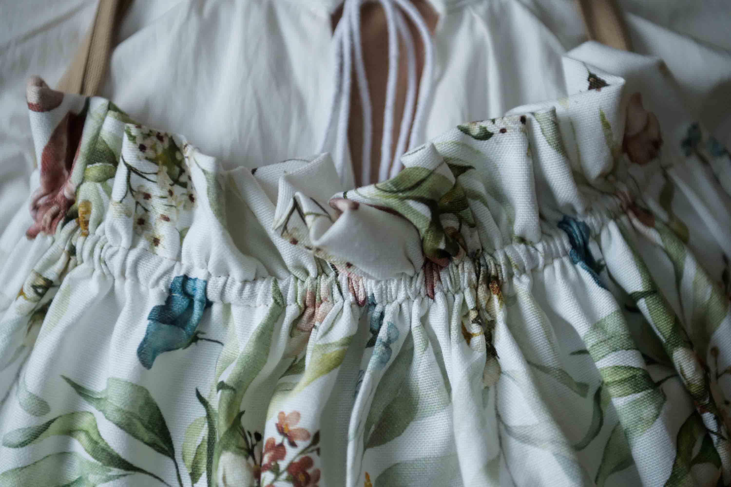 Floral-patterned apron with a white background