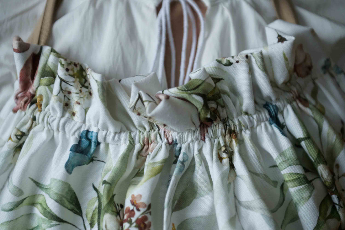 Floral-patterned apron with a white background