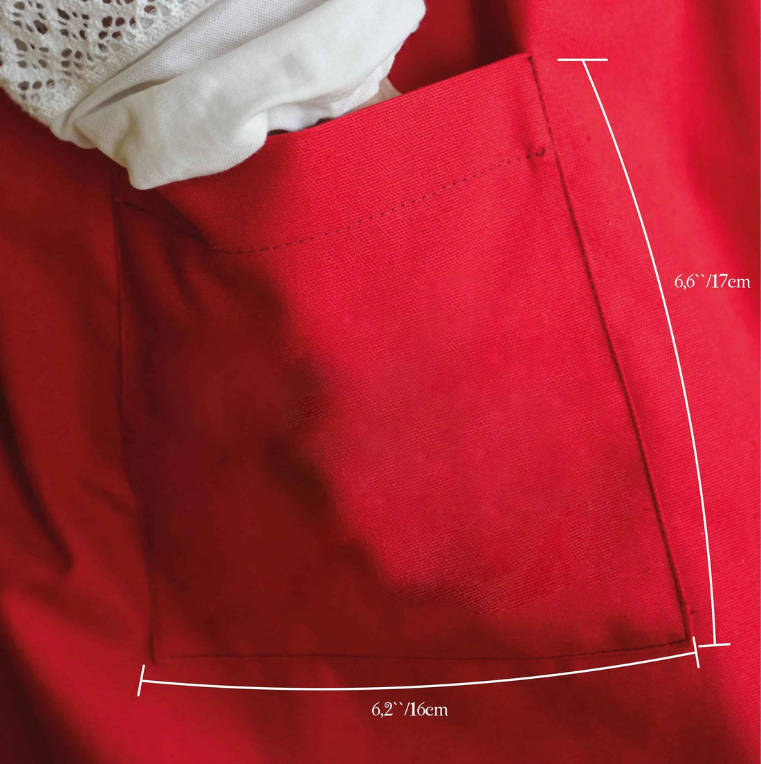 Red pocket with measurements on a red garment