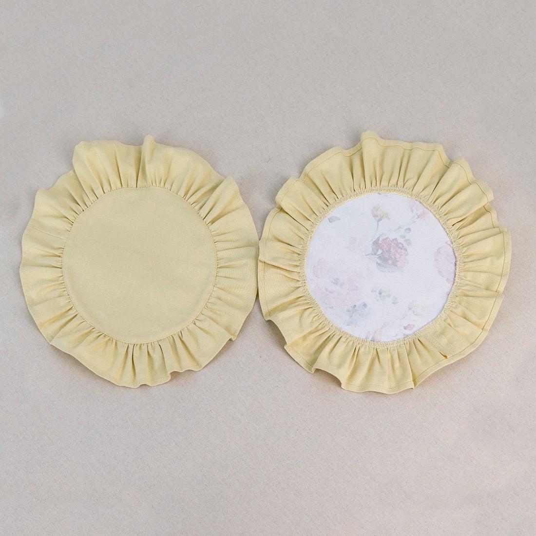 Yellow placemat set with peach and coral rose print