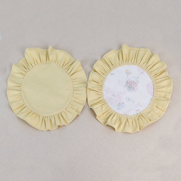 Yellow placemat set with peach and coral rose print